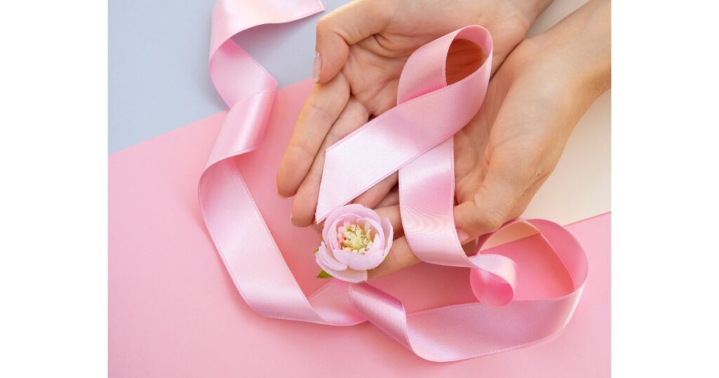 close up person with pink ribbon top view